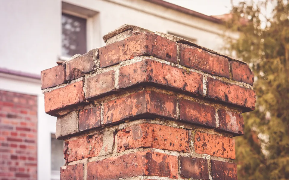 worn down brick chimney