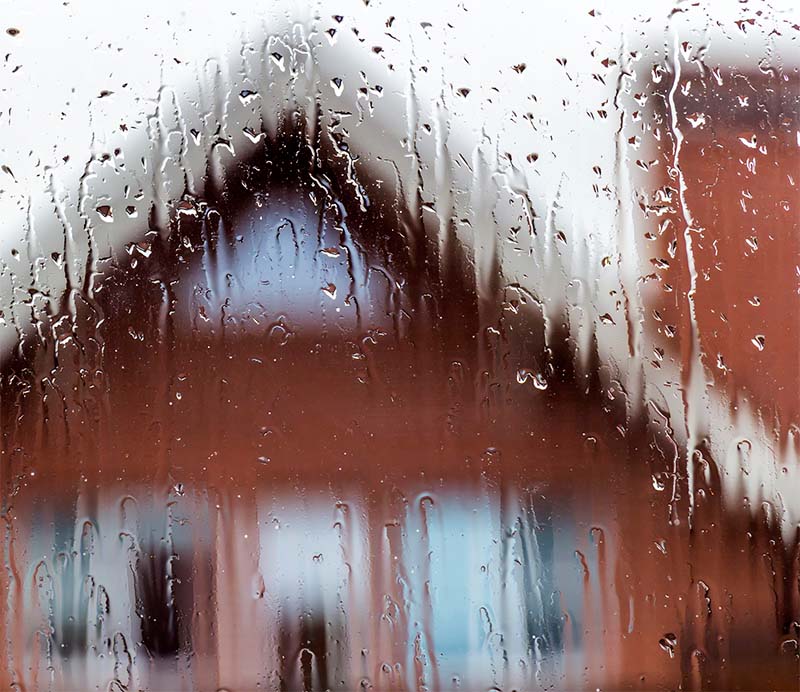 View of house in the rain