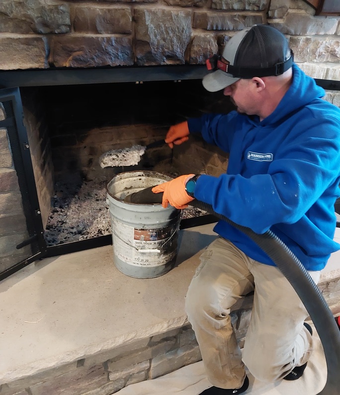 Chimney on metal roof with windows